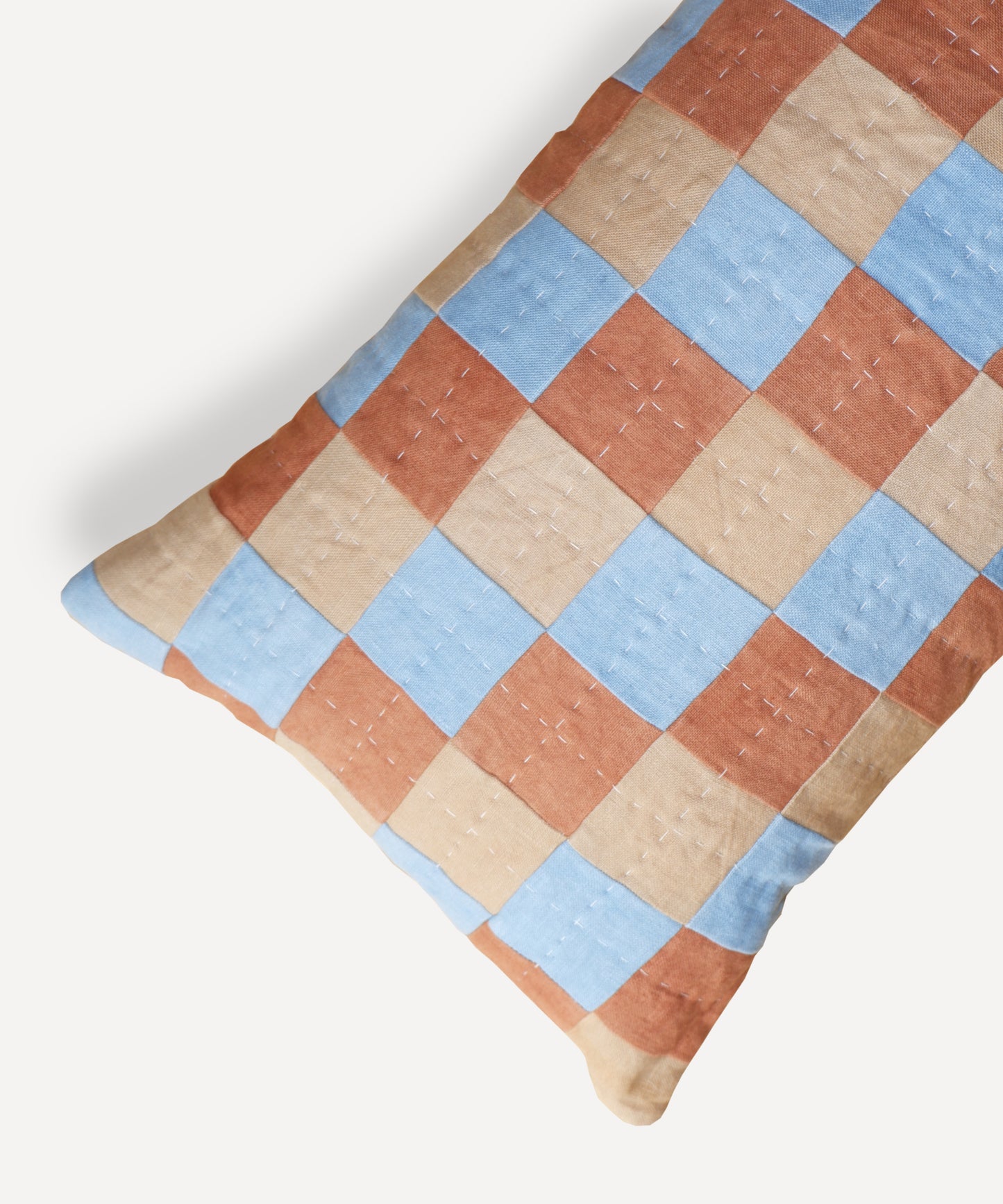 CHEQUERED CUSHION IN BLUE, TERRACOTTA AND CREAM